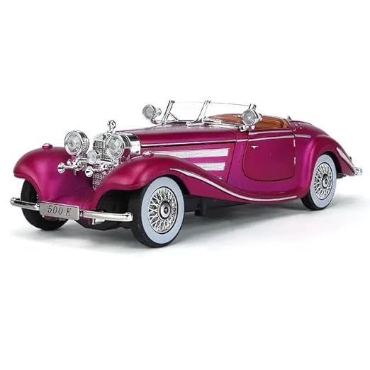 Model of a vintage car with a shiny purple finish on a white background