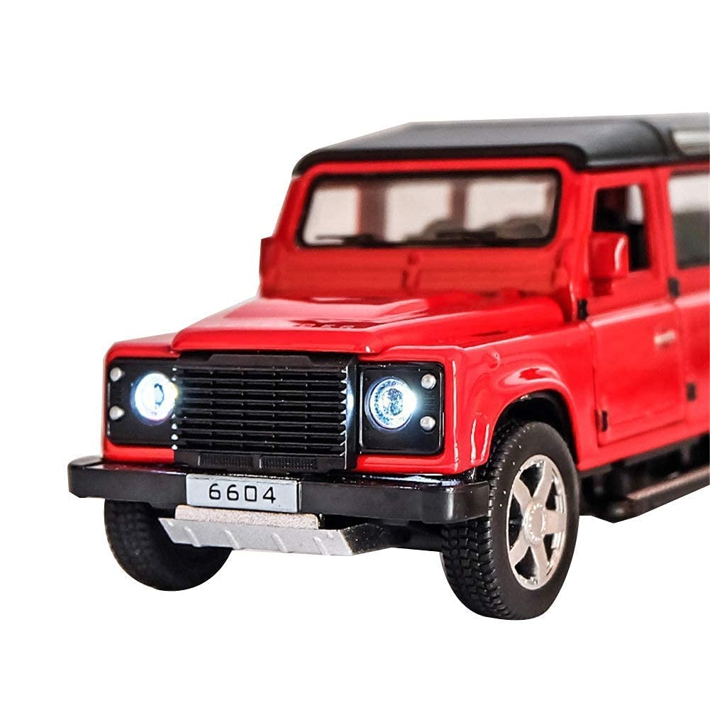 Red toy Land Rover Defender on a white background